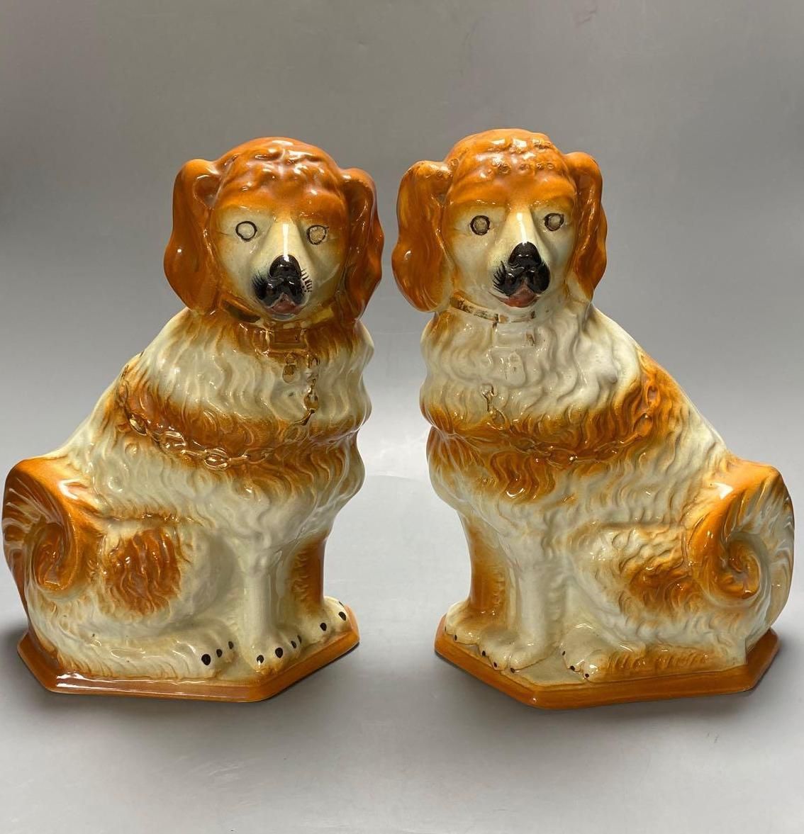 A pair of modern Staffordshire pottery dogs, 33cm